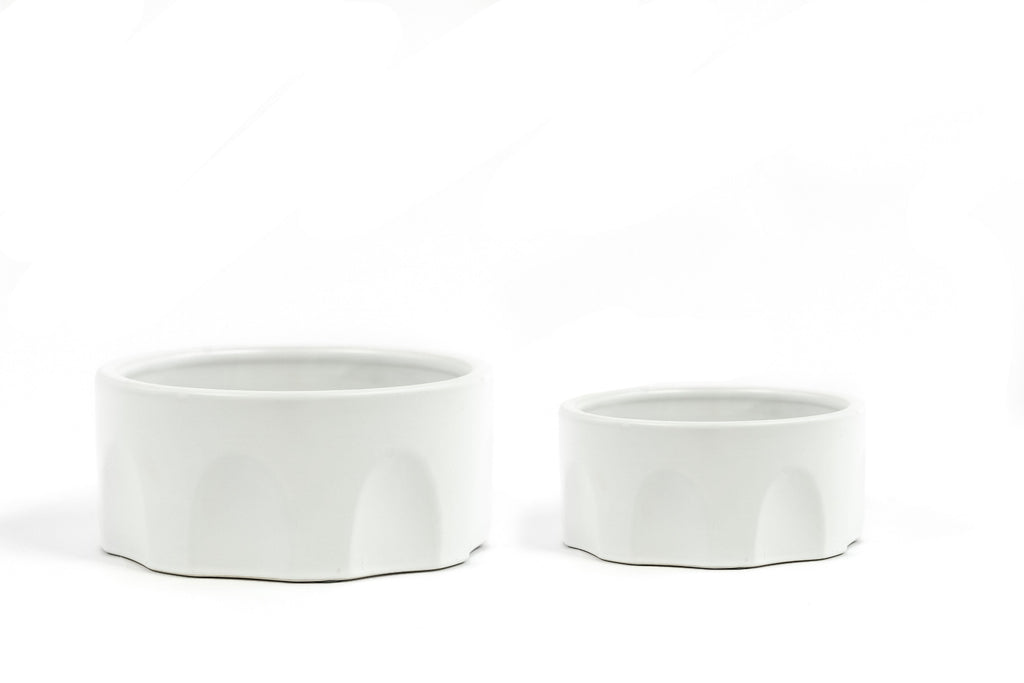 Pair of Small and Large White Porcelain Bowls with arch design on the sides.