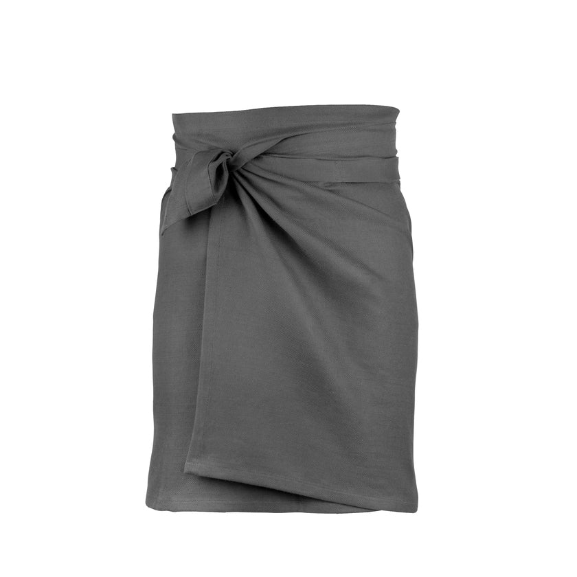 Handwoven cotton dark gray towel that is styled as an apron via the loops at the top that you can tuck the towel through.