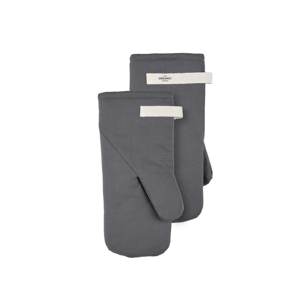 Two dark gray organic cotton oven mitts with white hanging loops. White background.