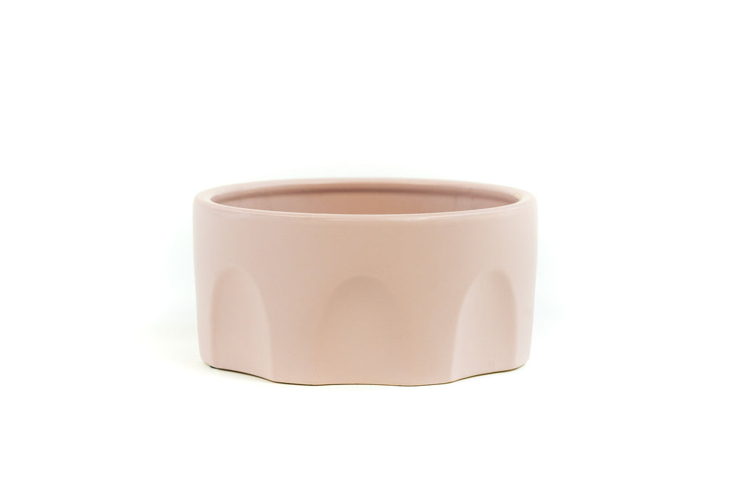 Small Blush Pink Porcelain Bowl with arch design on the sides.