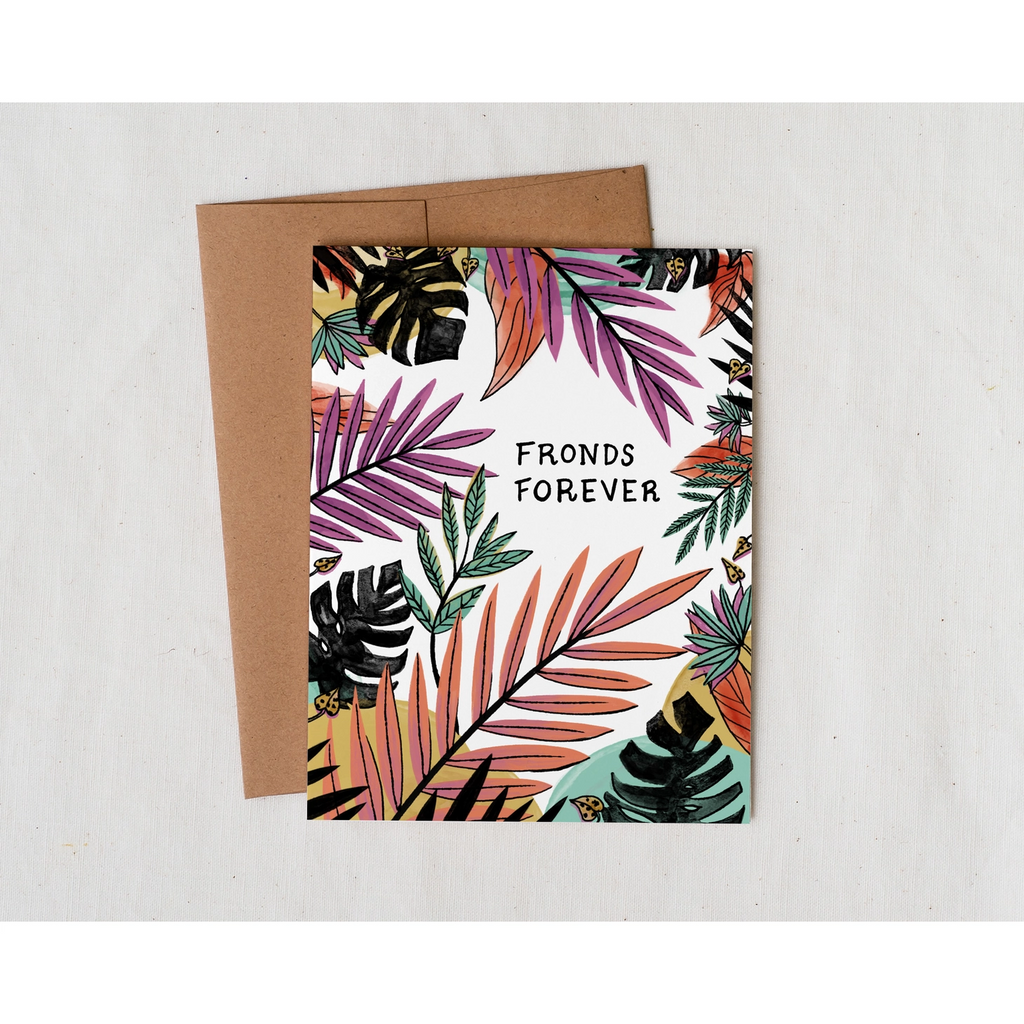 Greeting card with drawn tropical leaf illustration in bright colors. 'Fronds Forever'. White card and kraft envelope.