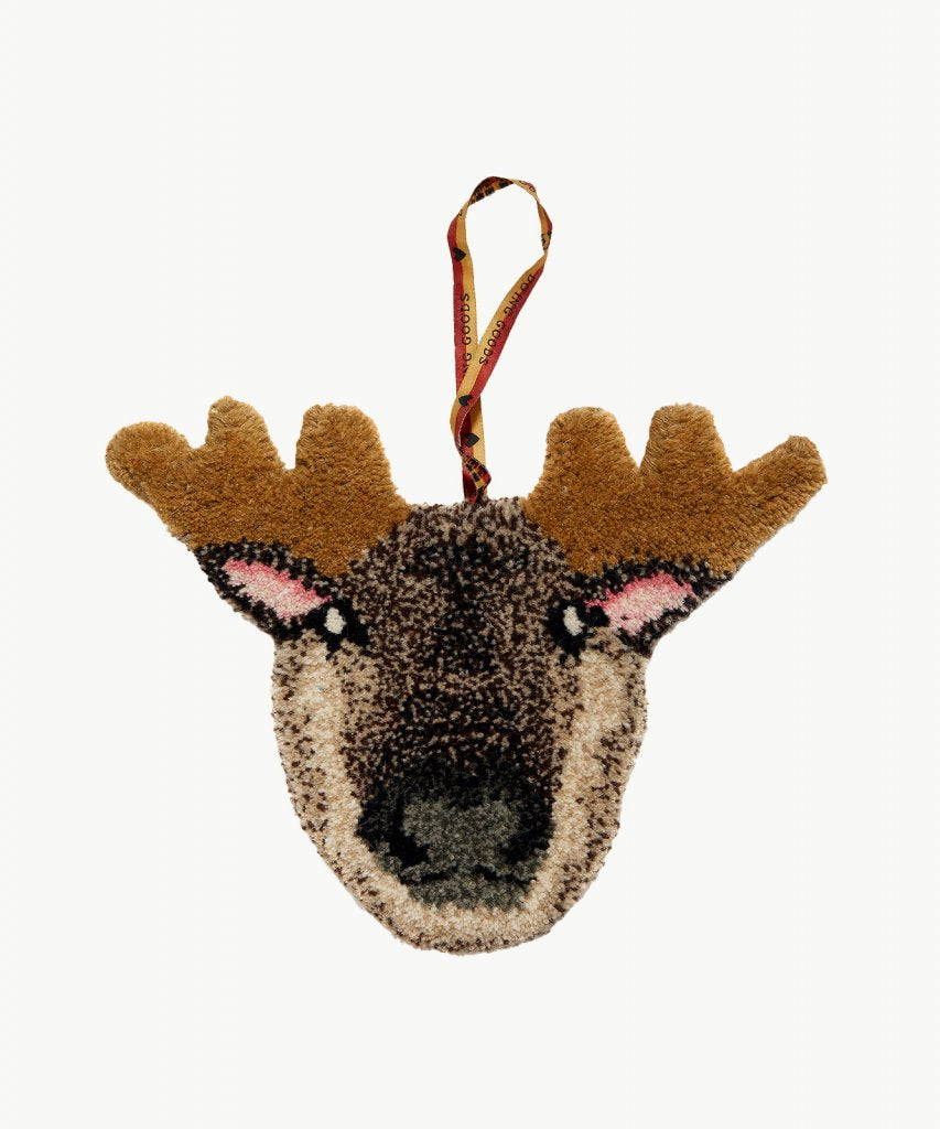 A hand tufted moose head that can be used as a gift hanger or on a wall to add whimsy!