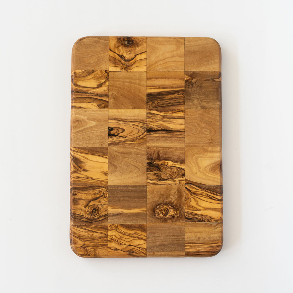 Rectangle olive wood mosaic board with rounded corners on a white background.