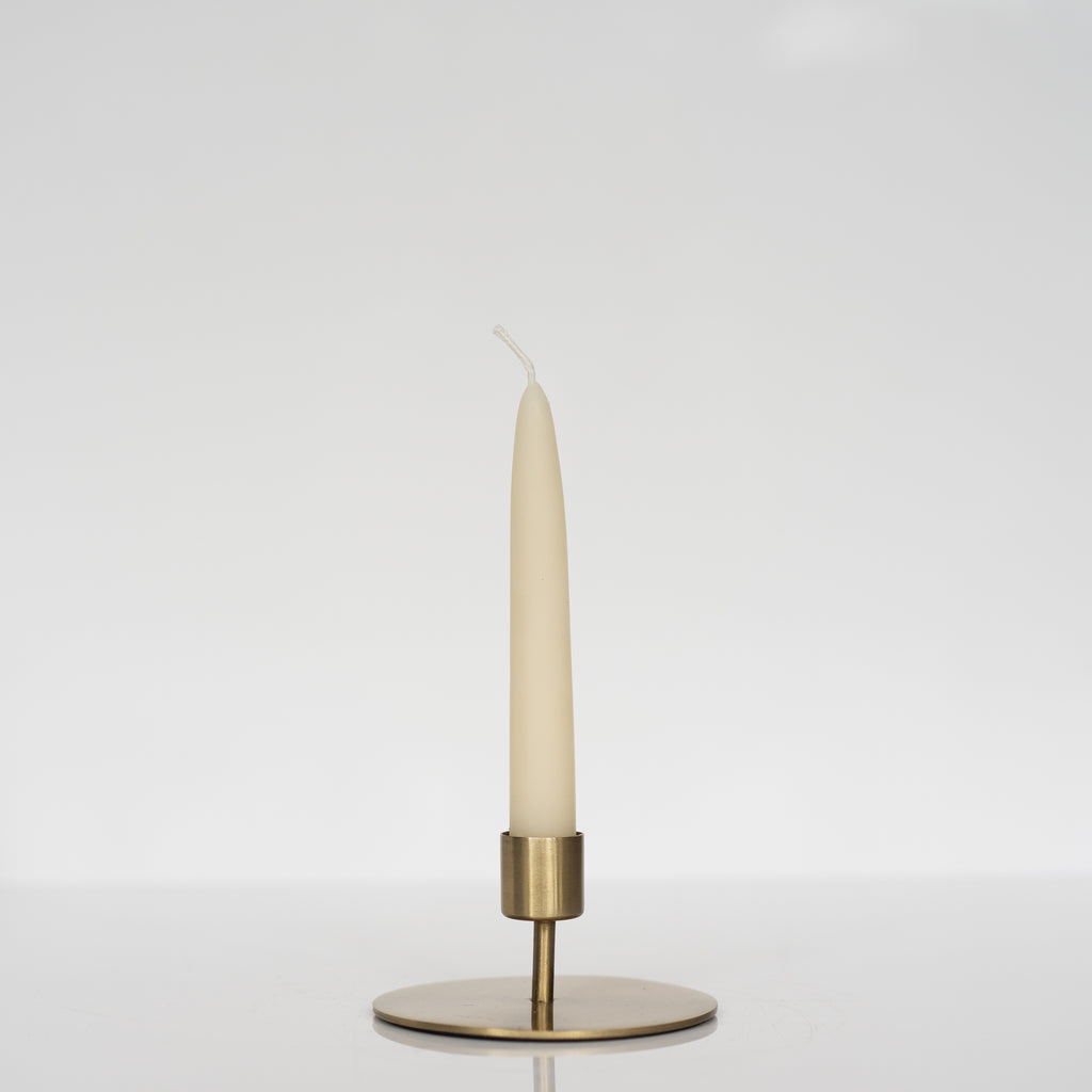 Small size of gold finish taper candle holder. It has a large round flat base with a thin stem and perfectly sized cup for the taper candle.