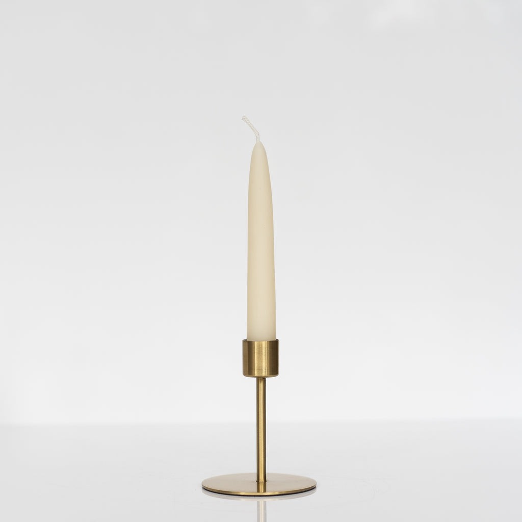 Medium size of gold finish taper candle holder. It has a large round flat base with a thin stem and perfectly sized cup for the taper candle.