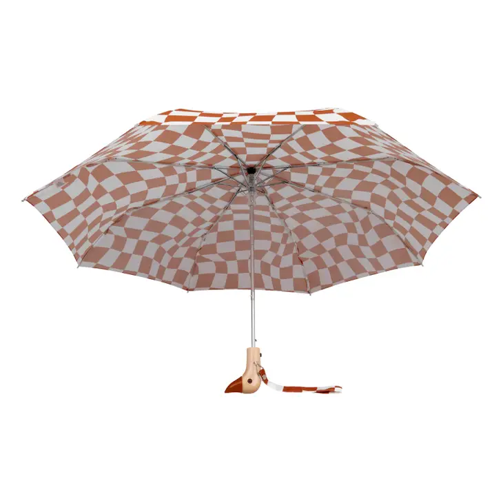 Clay and cream checkered duckhead umbrella open on a white background.